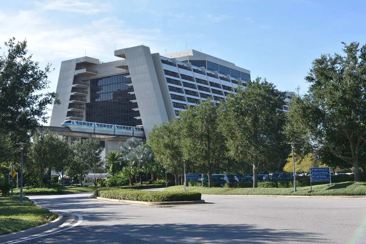 Disney's Contemporary Resort A-frame tower with a monorail train gliding into the building