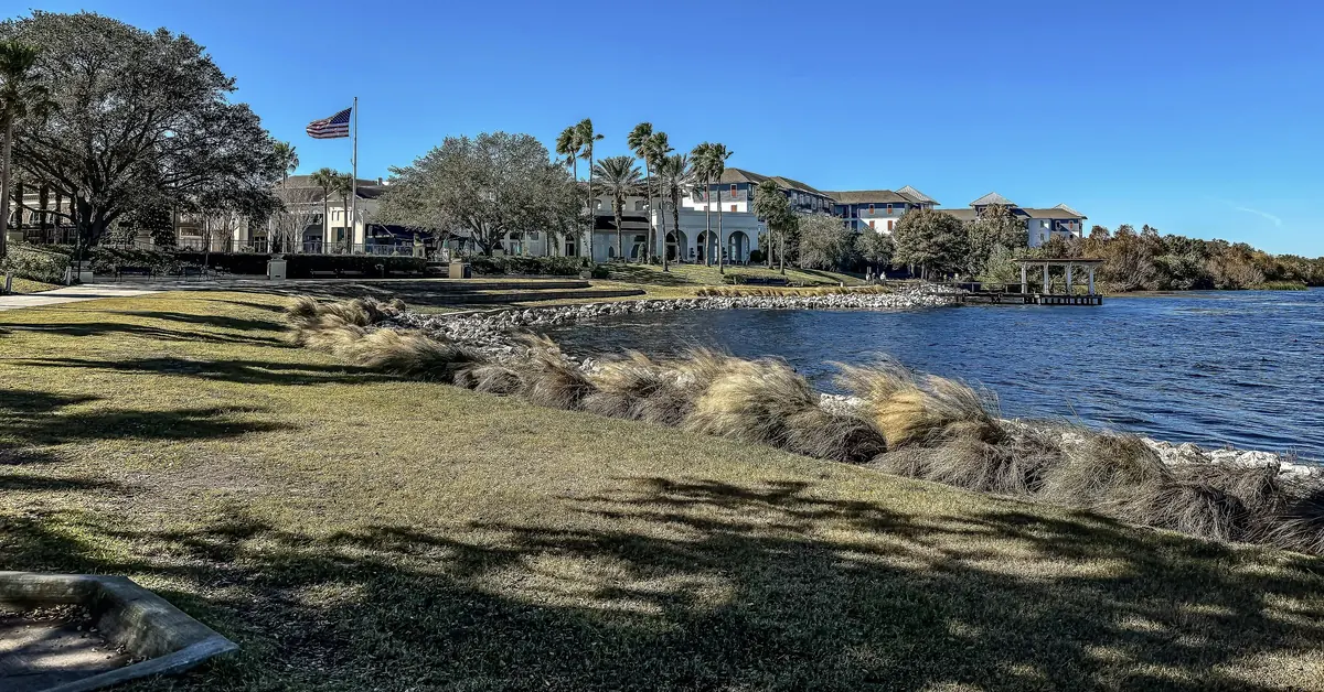 Public lakeside lawn and grasses on the shore of Lake Baldwin in Orlando's Baldwin Park