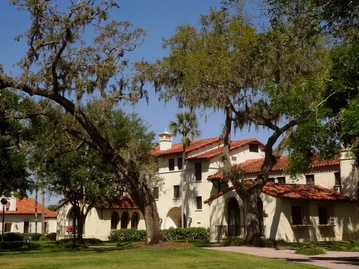 Red-tiled Spanish-style buildings under moss-draped oaks on the Rollins College campus, Winter Park